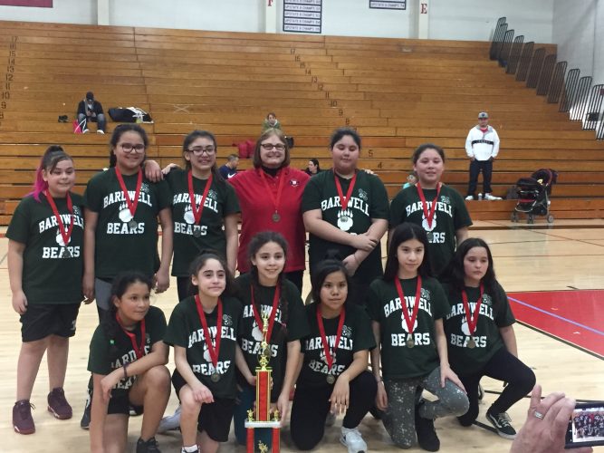 Bardwell girls basketball team celebrates their 2nd place finish. 