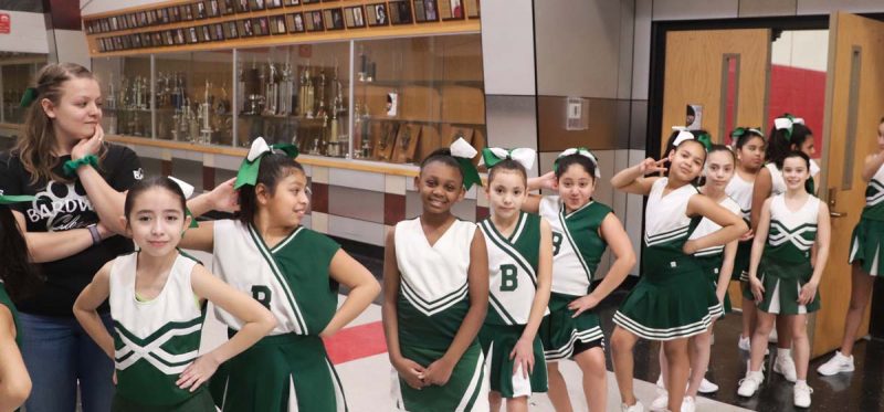 Bardwell's Cheer-leading squad strikes a pose prior to their routine