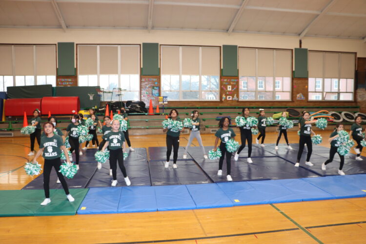 Bardwell cheerleaders perform at a pre-tournament assembly.
